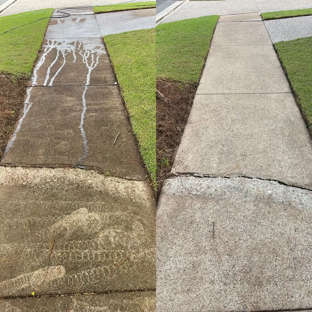 High pressure cleaning a commercial forecourt