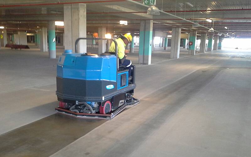 Scrubbing Machine Behind Rental Hire - Carpark Cleaning Brisbane
